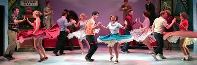 Couples on stage dancing